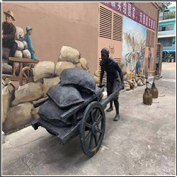 仿銅創(chuàng)意推車(chē)人物銅雕塑 仿銅創(chuàng)意推車(chē)人物銅雕塑